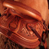 Douglas 38 Wade - tree by Rick Reed, 15 and 1/4 inch seat, Gullet - 7 and 1/2 inch by 6 and 1/4 inch by 4 inch, Horn 3 inch round, 90 degree bars, 7/8ths flat palte riggin, Cheyenne Roll, Sheridan Style Floral Carving bordered with Vaquero Lace.